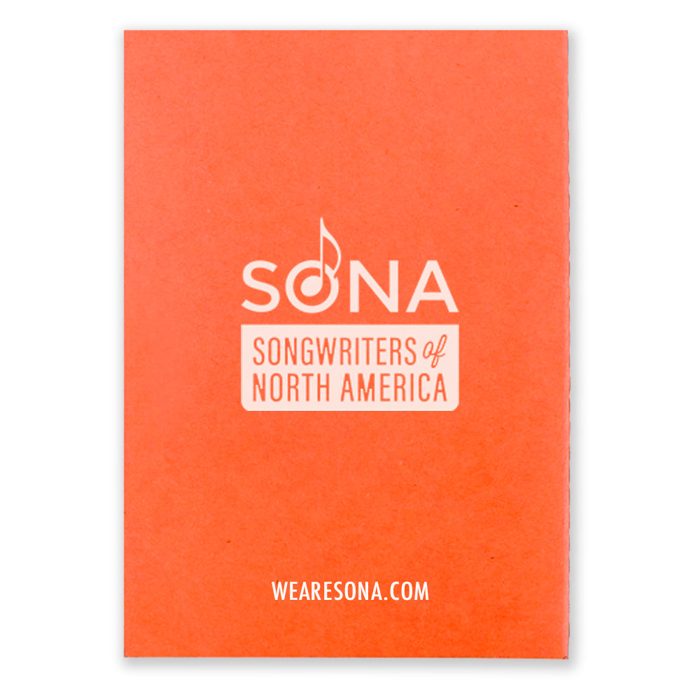 An orange notebook that says SONA Songwriters of North America in white text