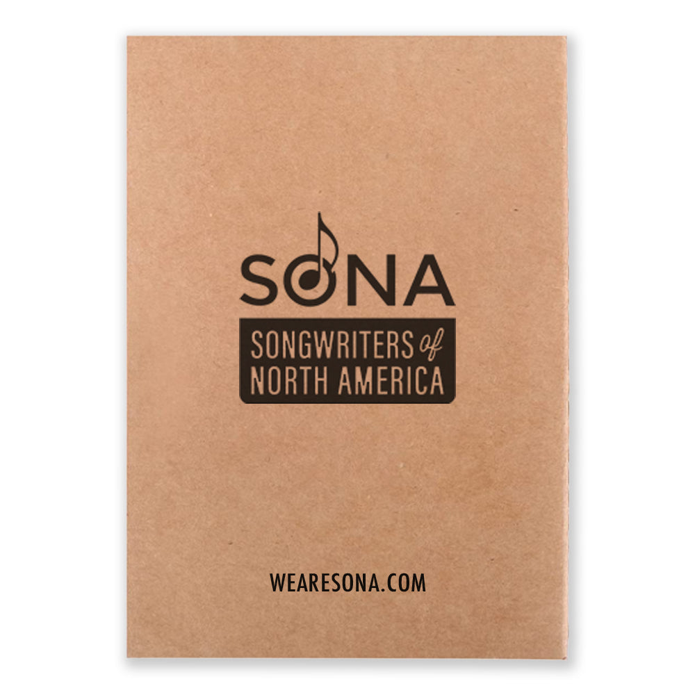 A beige notebook that says "SONA Songwriters of North America"