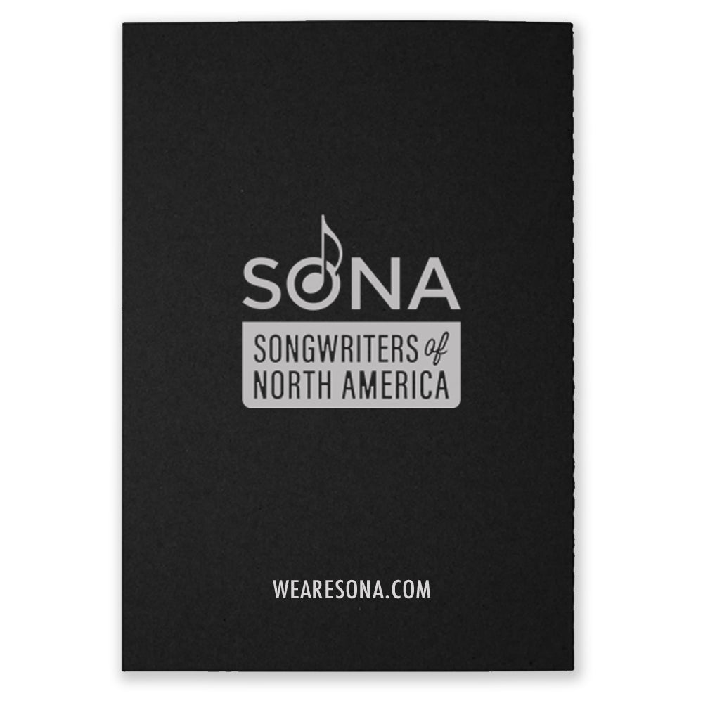 A black notebooks that say "SONA Songwriters of North America" on the front