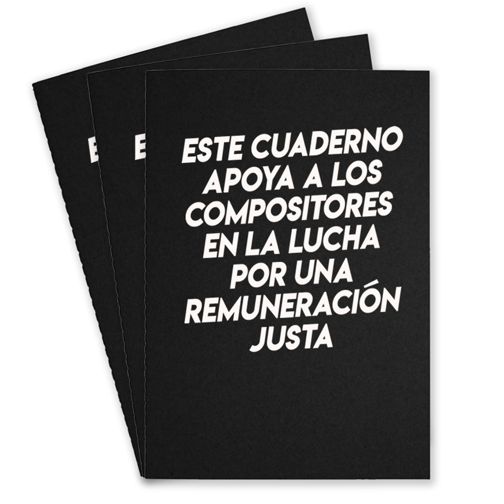 3 black notebooks that says "Este Cuaderno Apoya A Los Compistores En La Lucha Por Una Remuneracion Justa" on the front with white text